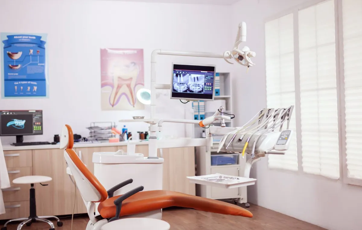 Dentist welcoming a patient in a modern dental practice