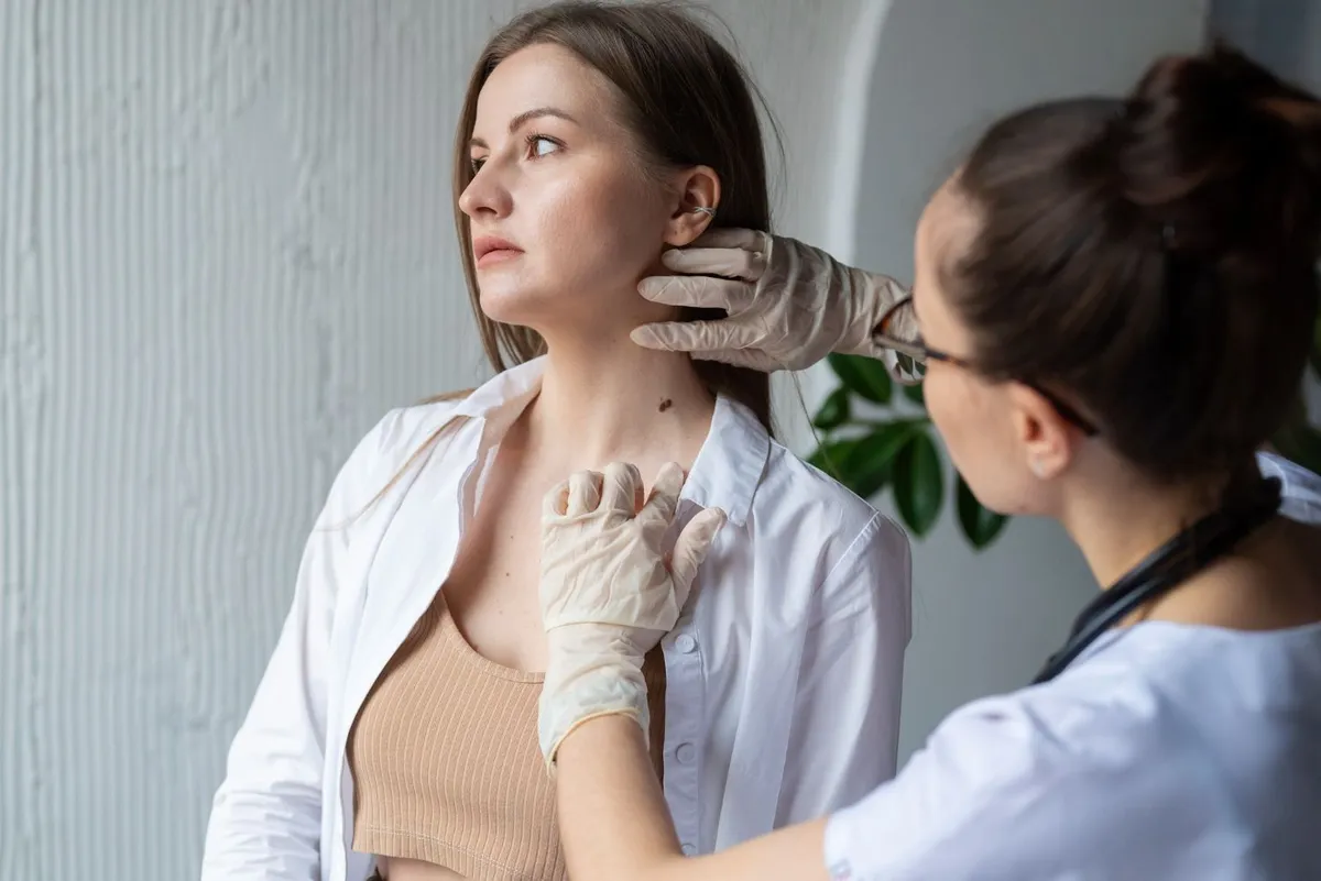 Dermatologist consulting with a patient in a clinic